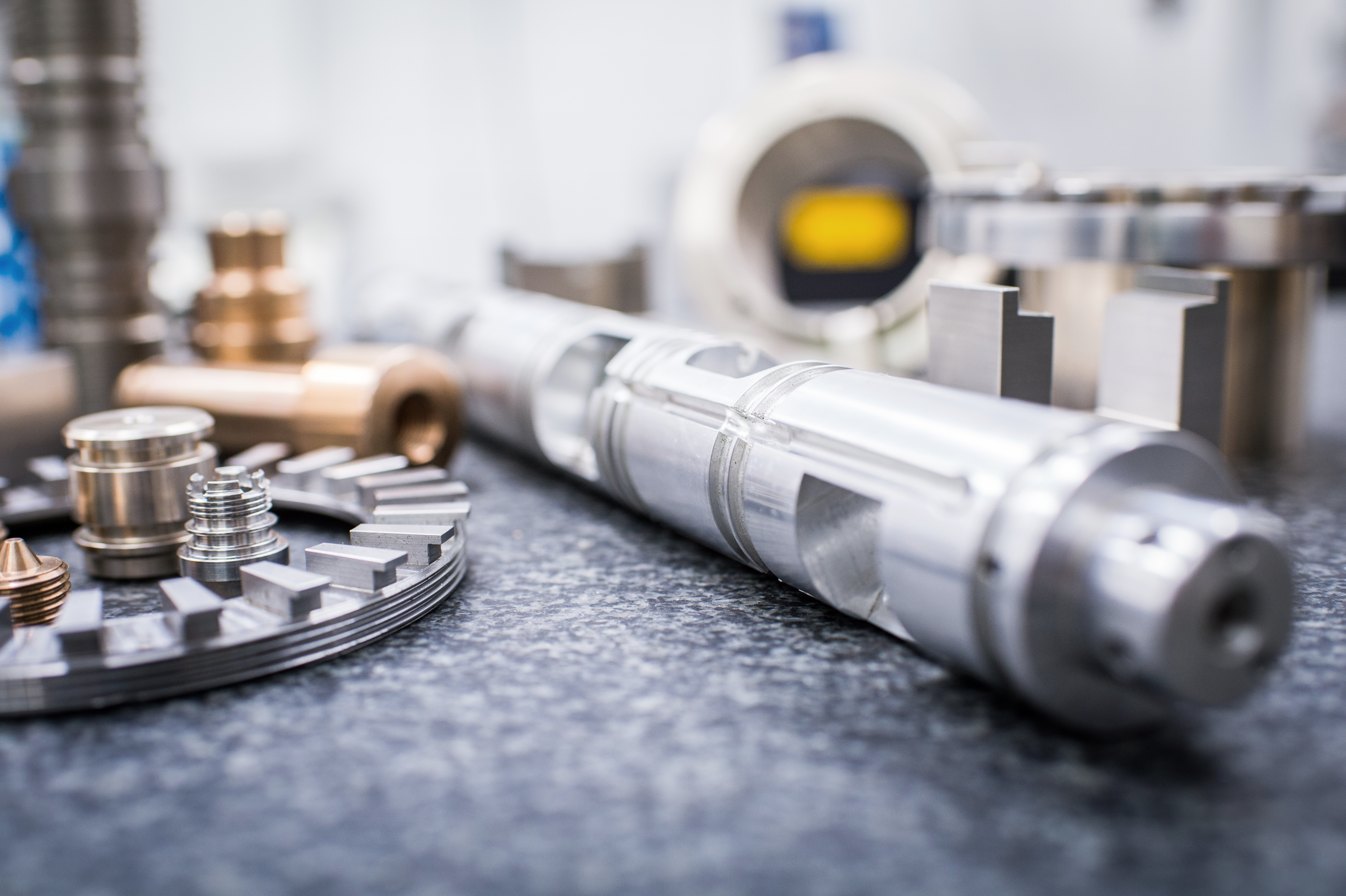 advanced engineering parts on a grey counter